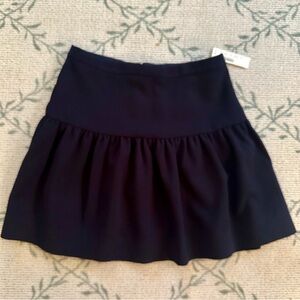 J.Crew drop-waist flounce mini skirt in navy blue. Size 0. Polyester. Lined. New